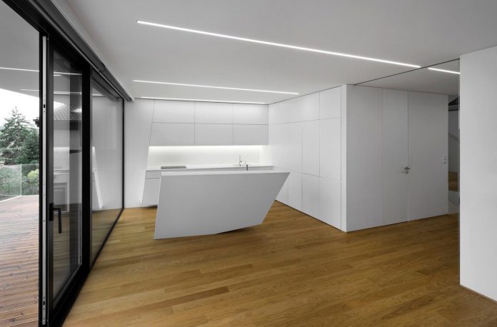 minimalist-home-design-located-south-sloping-plot-residential-part-prague-07